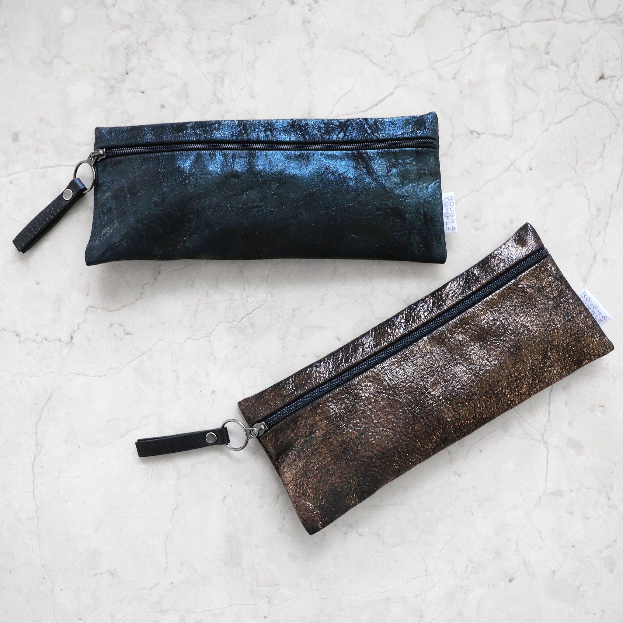 district slips in mica bronze and black with mica blue and falcon