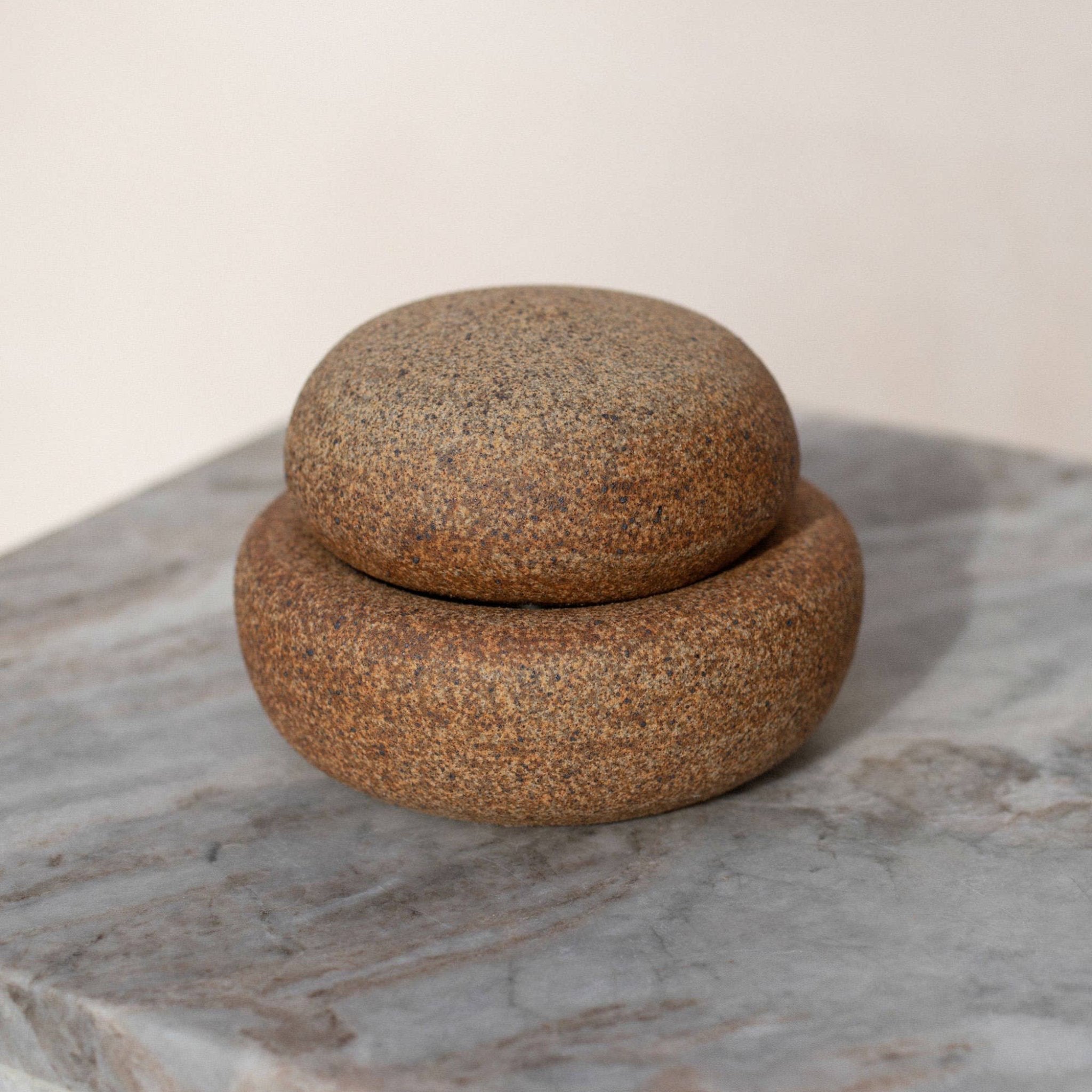 stoneware ceramic container on table