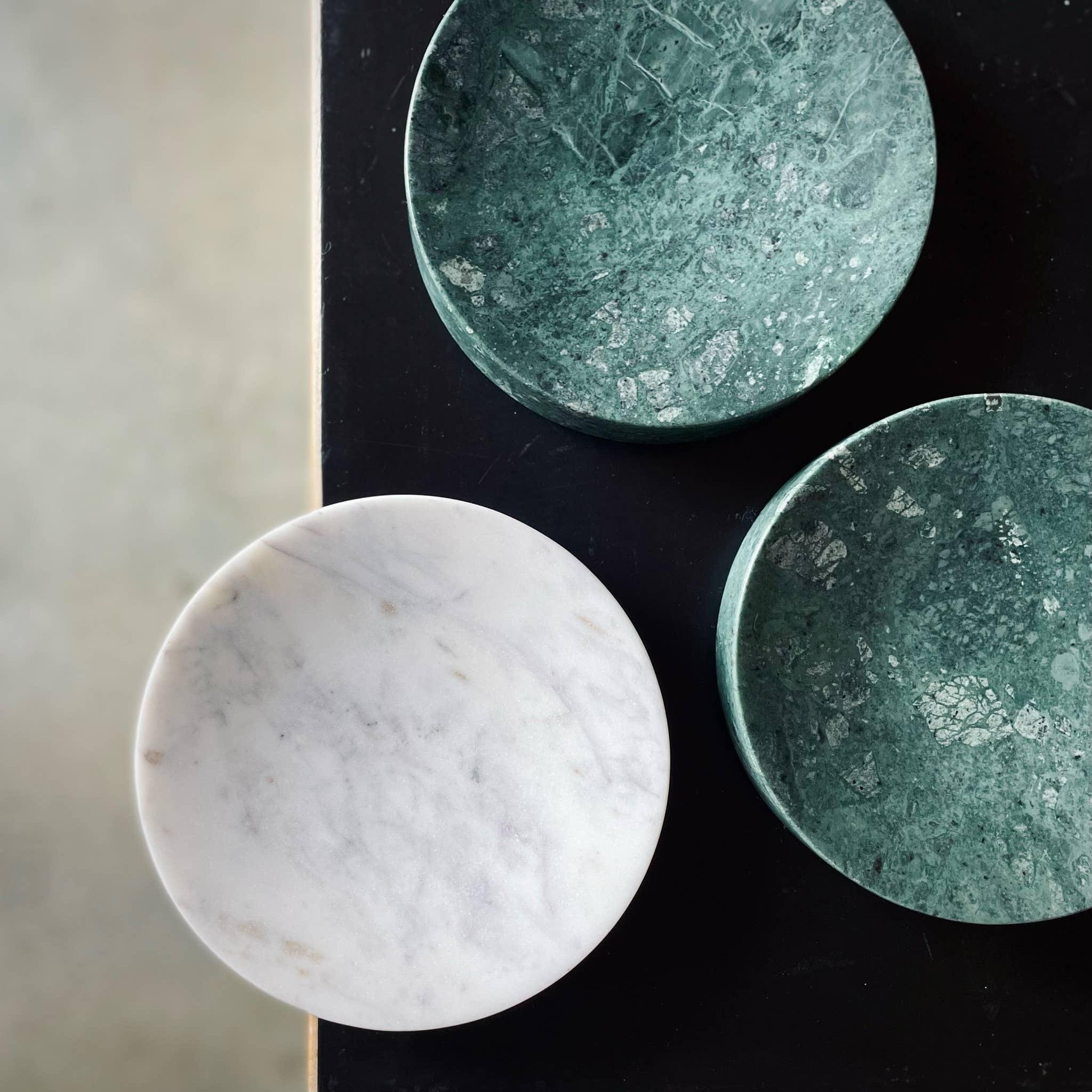 marble dishes in forest green and pearl white