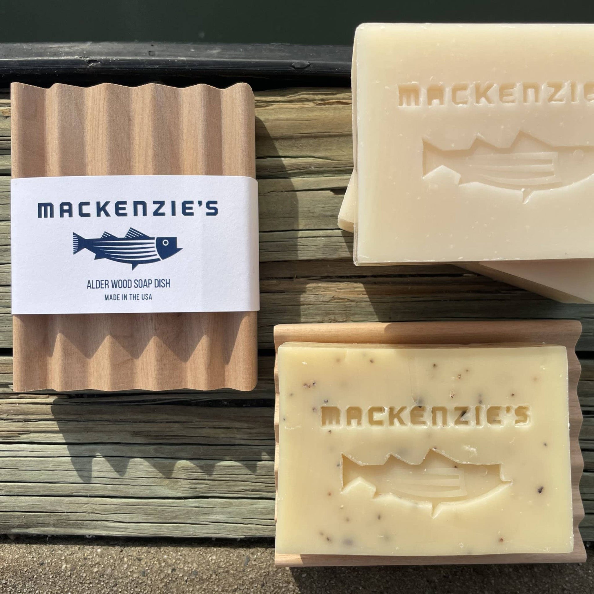 macKenzie's signature soap dishes next to mackenzie's soap