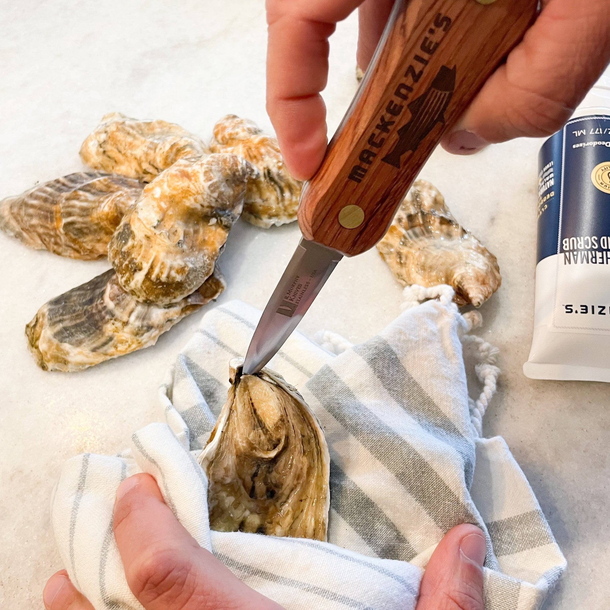 rosewood macKenzie's signature oyster shucker