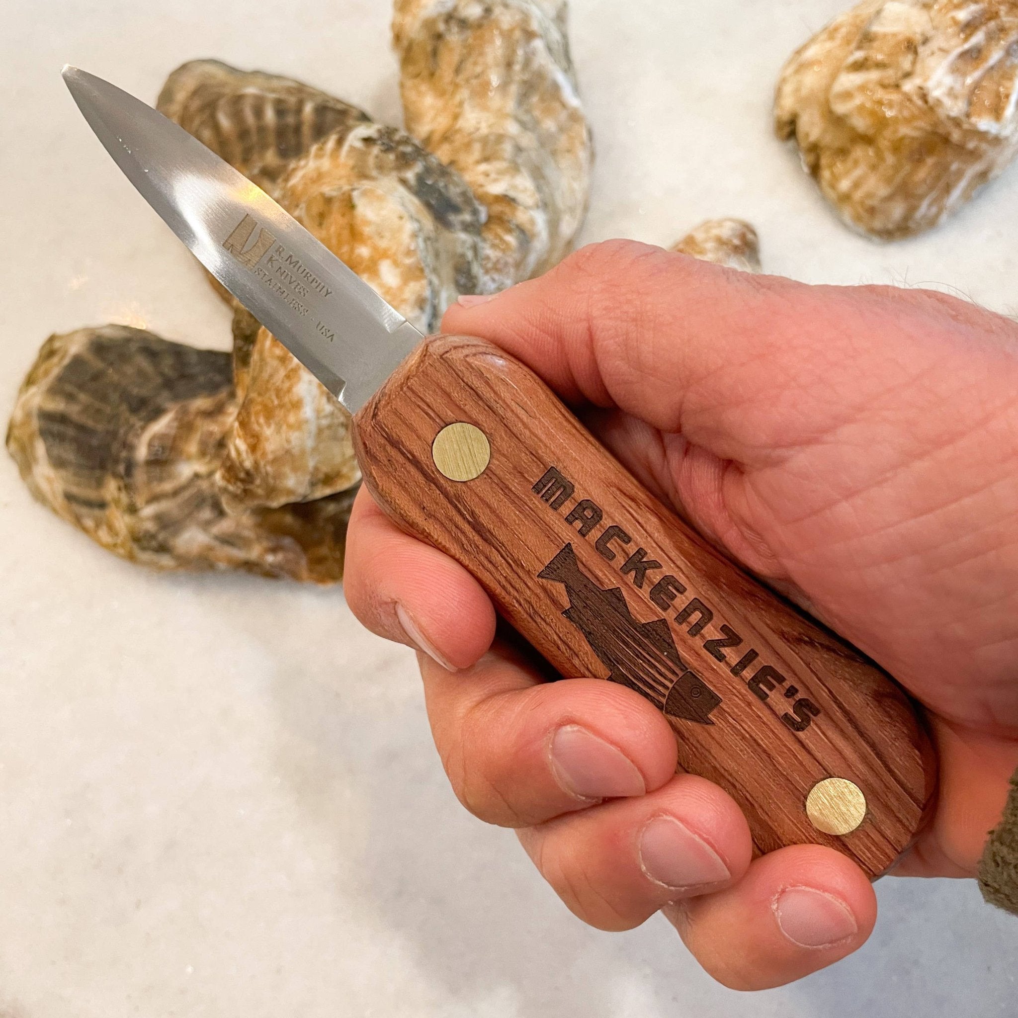 rosewood macKenzie's signature oyster shucker