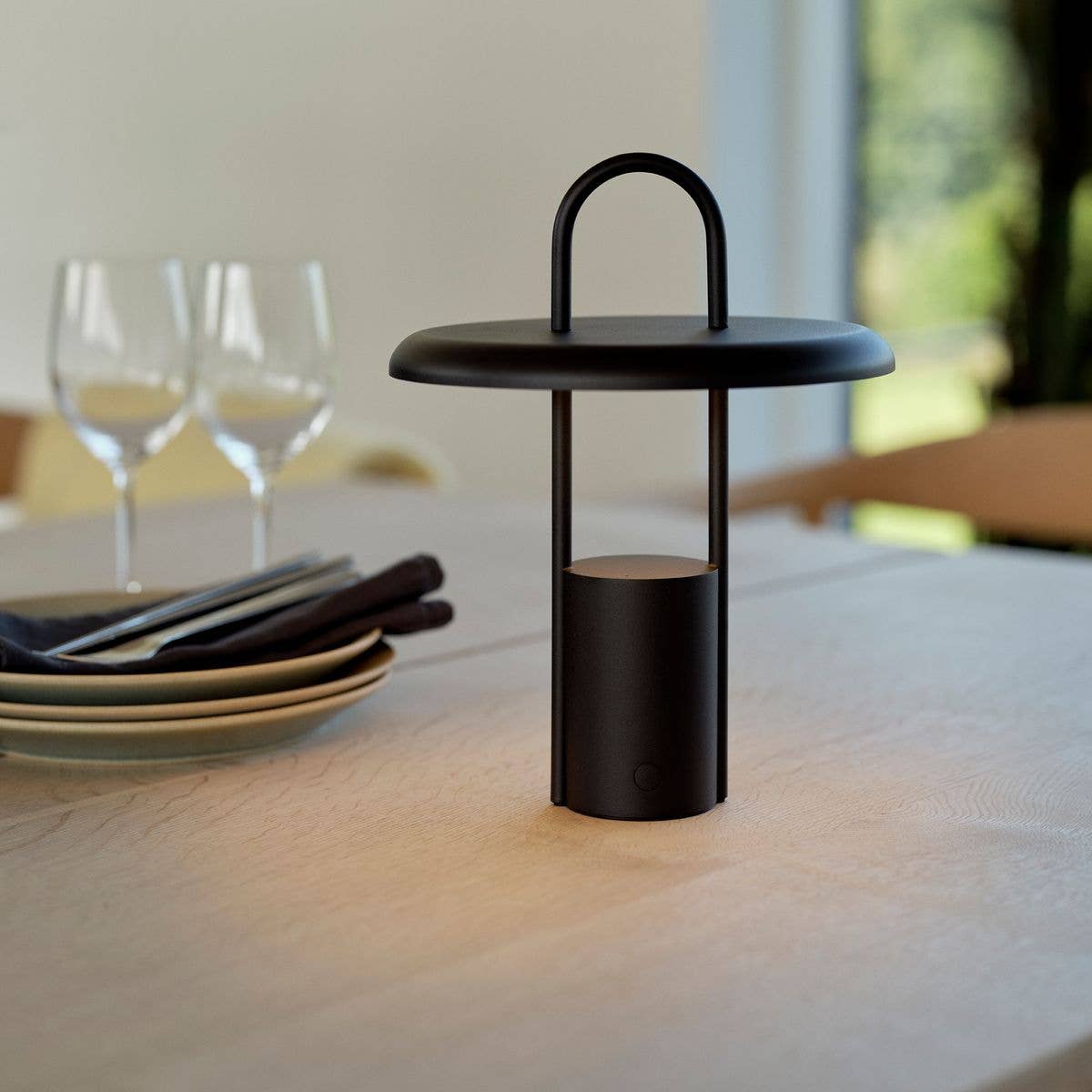 pier LED lamp - black (614) by stelton on kitchen table