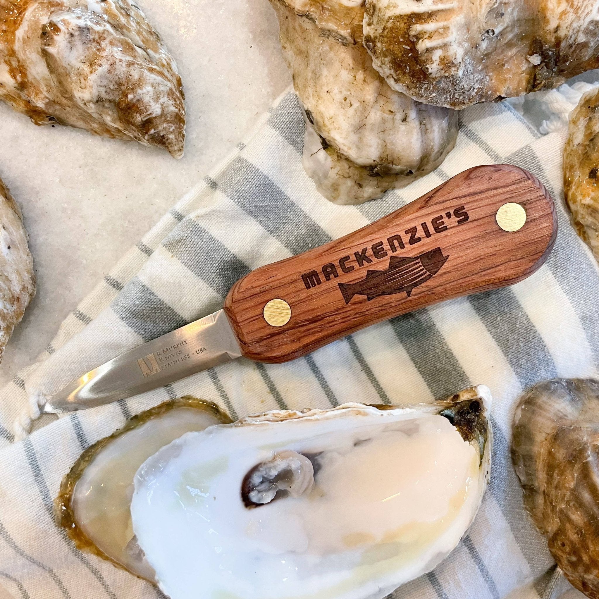 rosewood macKenzie's signature oyster shucker