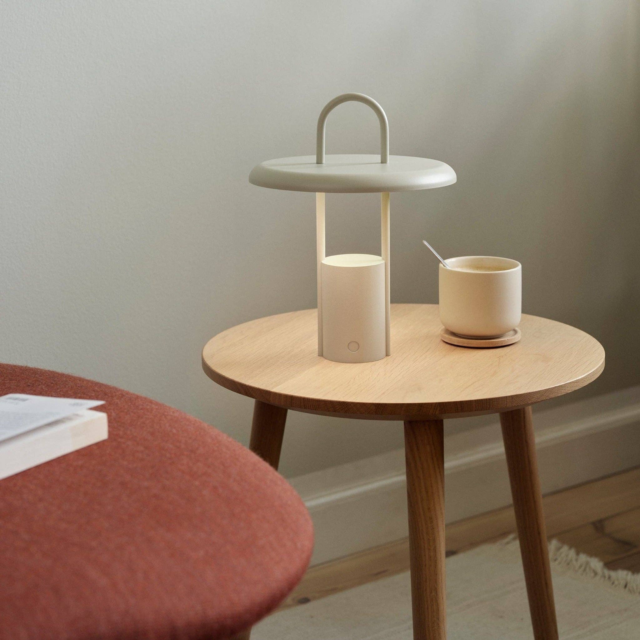 stelton led lamp  sand on table