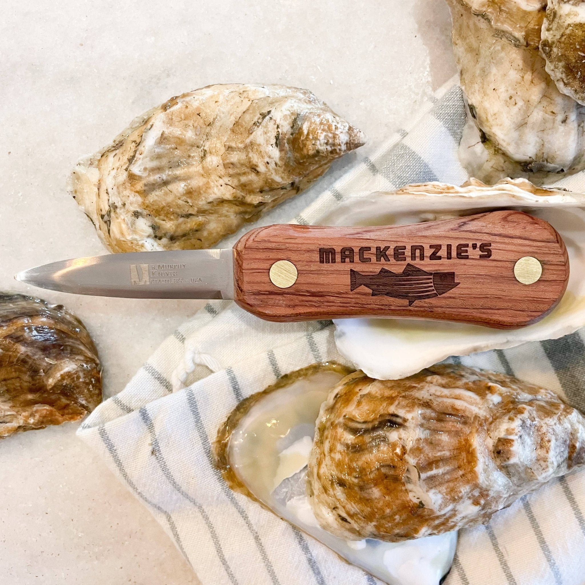 rosewood macKenzie's signature oyster shucker