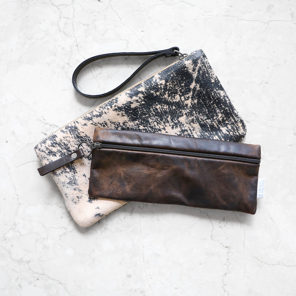 district slip in distressed espresso with a clutch in holland lop