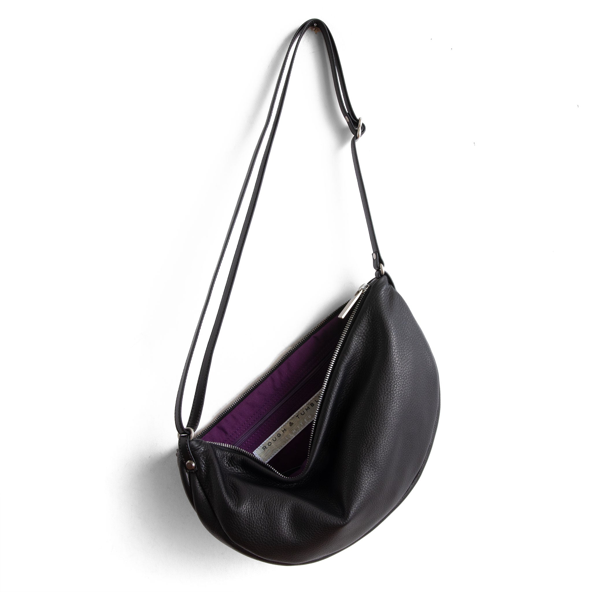 luna size large in nero black, showcasing interior purple lining