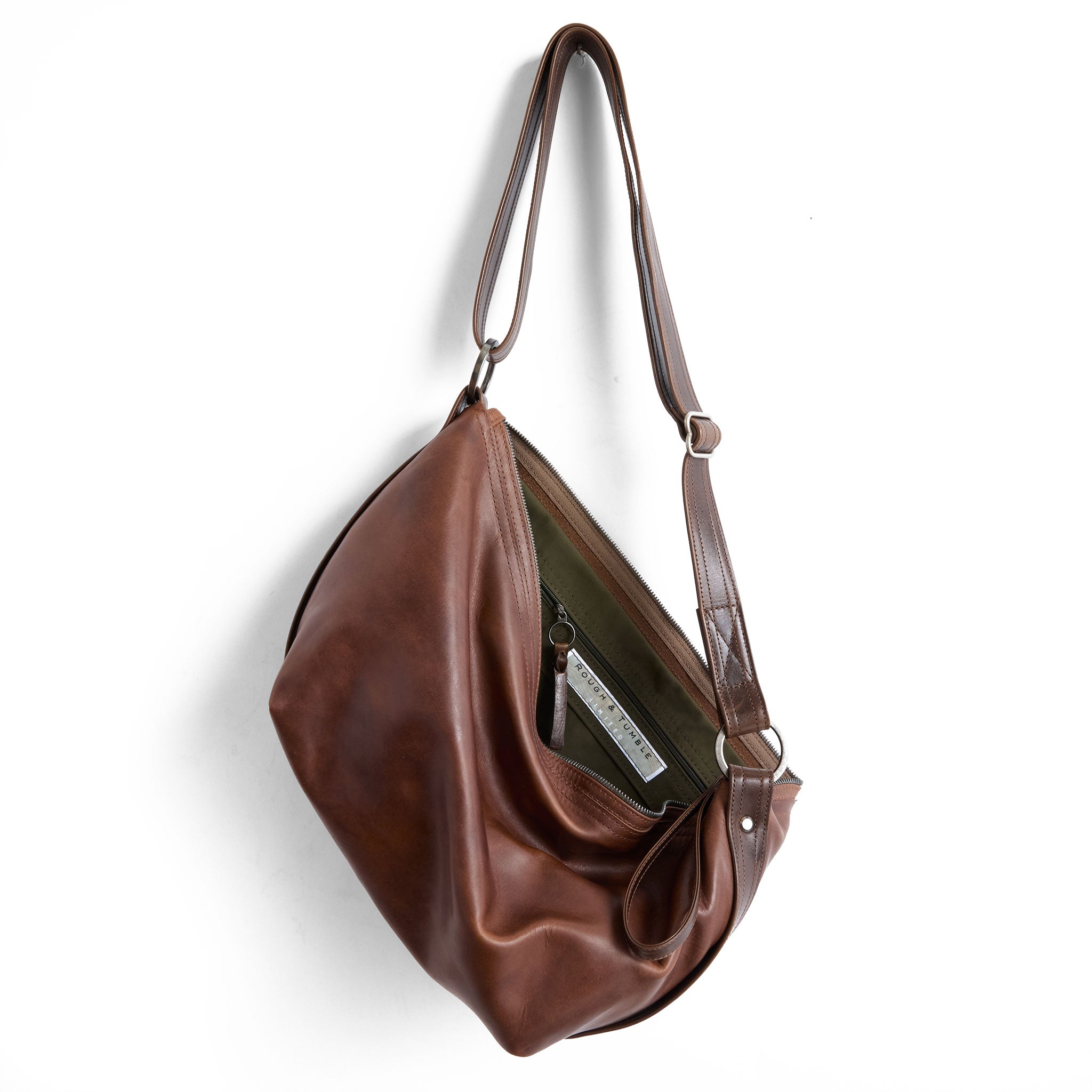 beau duffel in pure saddle, showcasing interior kelp lining