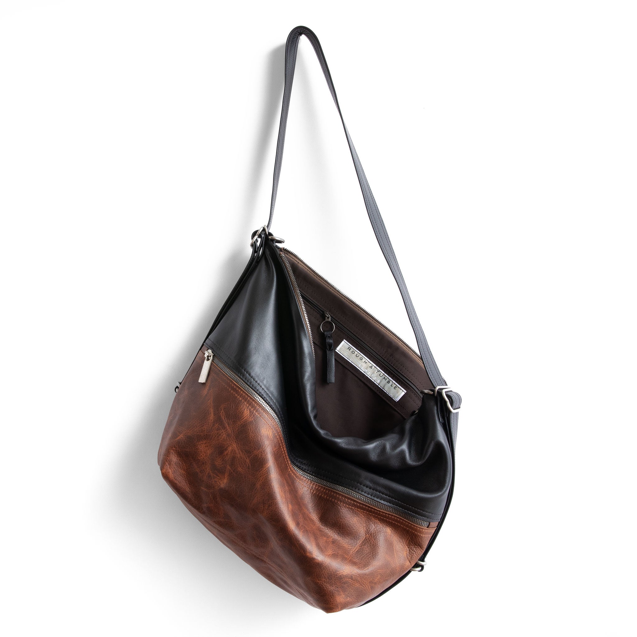 city single zip large with light fuentes base and plonge black top, showcasing interior cocoa lining