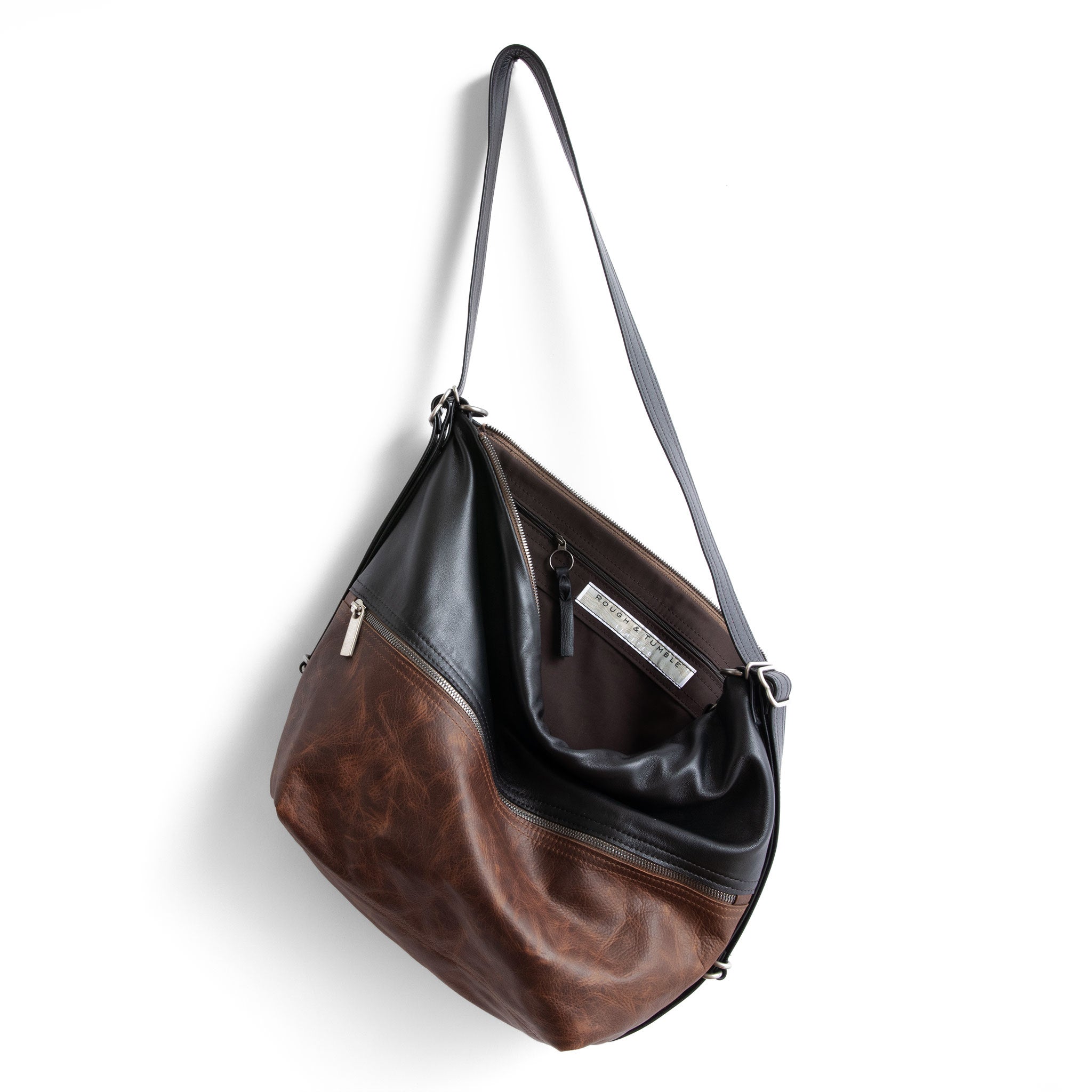 city single zip large with fuentes base and plonge black top, showcasing interior cocoa lining