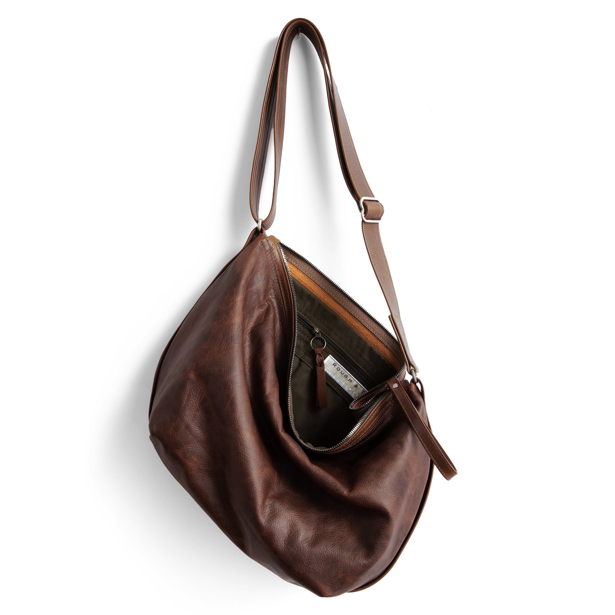 beau duffel with oval style hardware in fuente, showcasing interior kelp lining