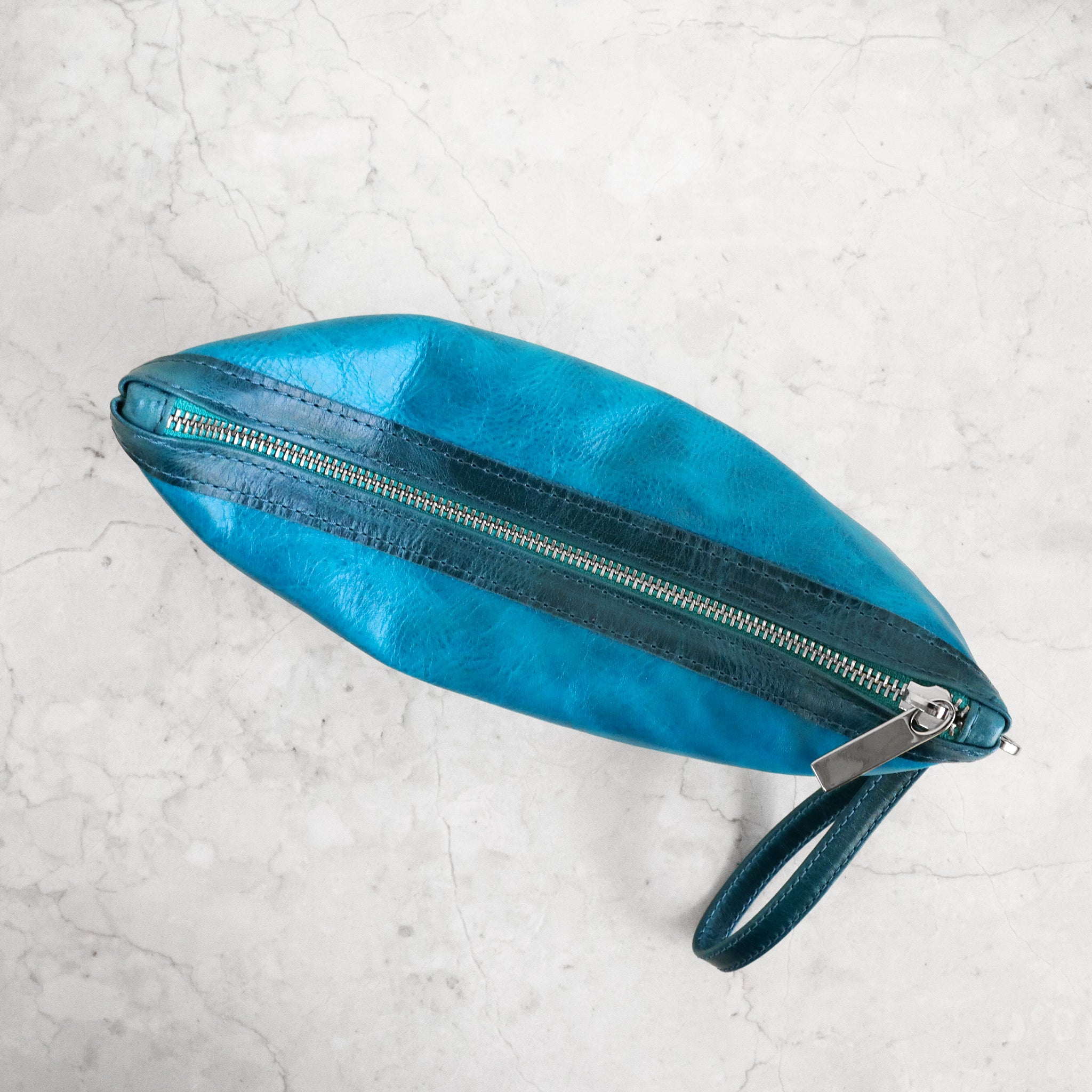 zip pouch with top stripe small in martinique and tourmaline showing nickel hardware